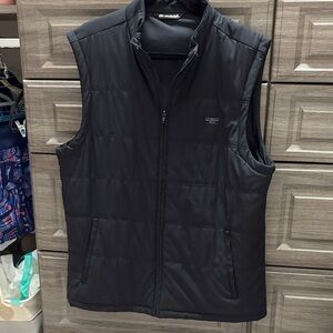Travis Matthew XL black puffer golf vest. Gently used in great condition.